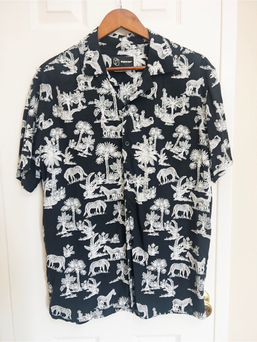 Original Use Black Short-Sleeve Button-Up with White Tropical Animal Print